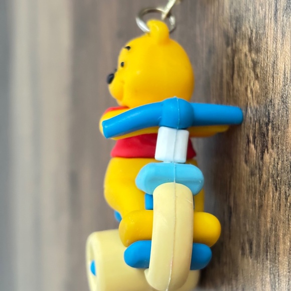 DISNEY Rubber & Metal Keychain Backpack Bag Clip WINNIE THE POOH Riding A Bike - Picture 7 of 9